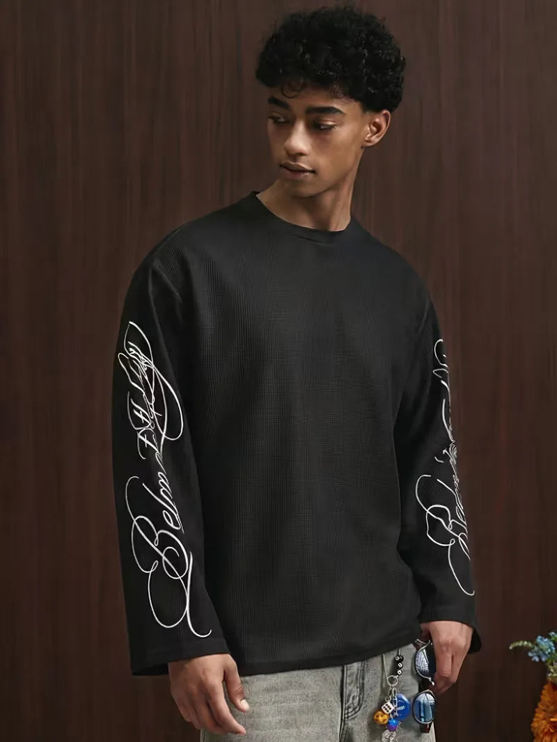 Oversize-Langarmshirt mit geschwungenem Alphabet-Schriftzug an den Ärmeln