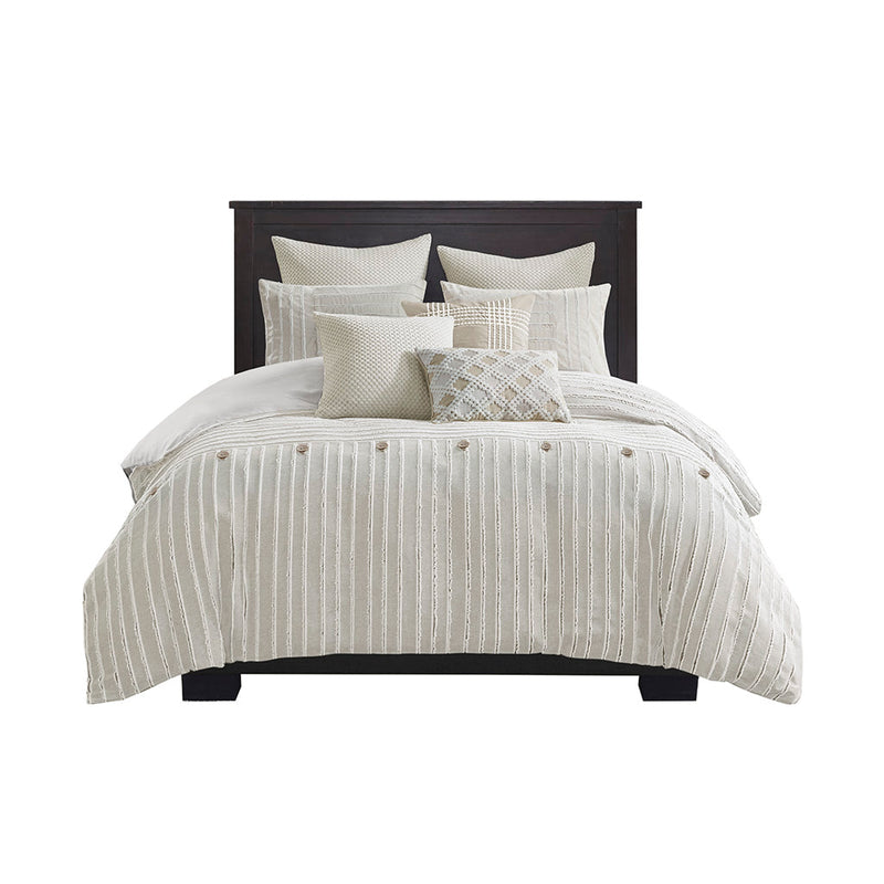 8-teiliges Bettdecken-Set mit gestreiftem Jacquard-Muster auf einem Bett