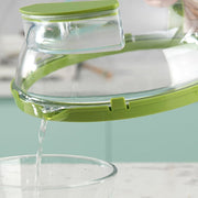 Transparente Mikrowellenabdeckung mit grünem Rand und Griffen