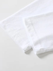 Langarmshirt mit Rundhalsausschnitt und kursiven schwarzen Schriftzügen