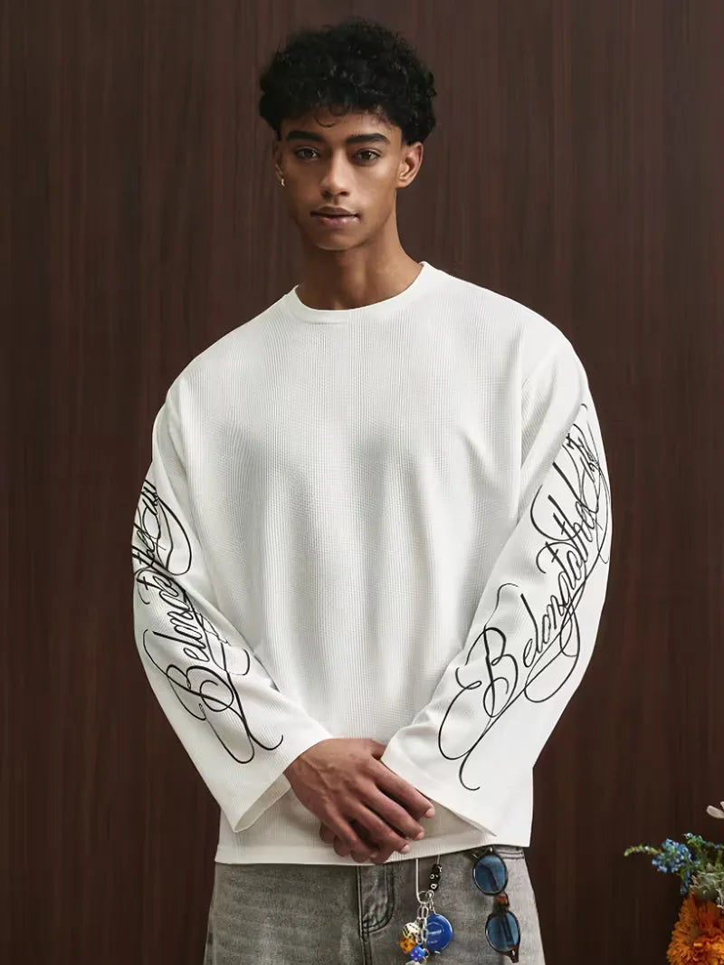Oversize-Langarmshirt mit geschwungenem Alphabet-Schriftzug an den Ärmeln