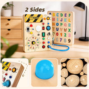 Busy Board aus Holz mit Lichtern, Schaltern und Knöpfen