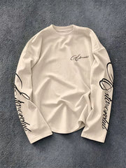 Langarmshirt mit Rundhalsausschnitt und Schriftzug auf den Ärmeln