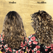 Orangefarbenes Haaröl Super Curl Hair Booster mit schwarzem Pumpspender
