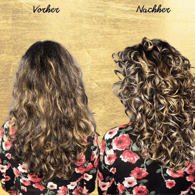 Orangefarbenes Haaröl Super Curl Hair Booster mit schwarzem Pumpspender