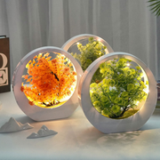 Dekorative LED-Leuchte mit Kunstpflanze