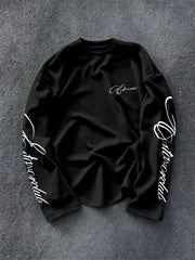 Langarmshirt mit Rundhalsausschnitt und Schriftzug auf den Ärmeln