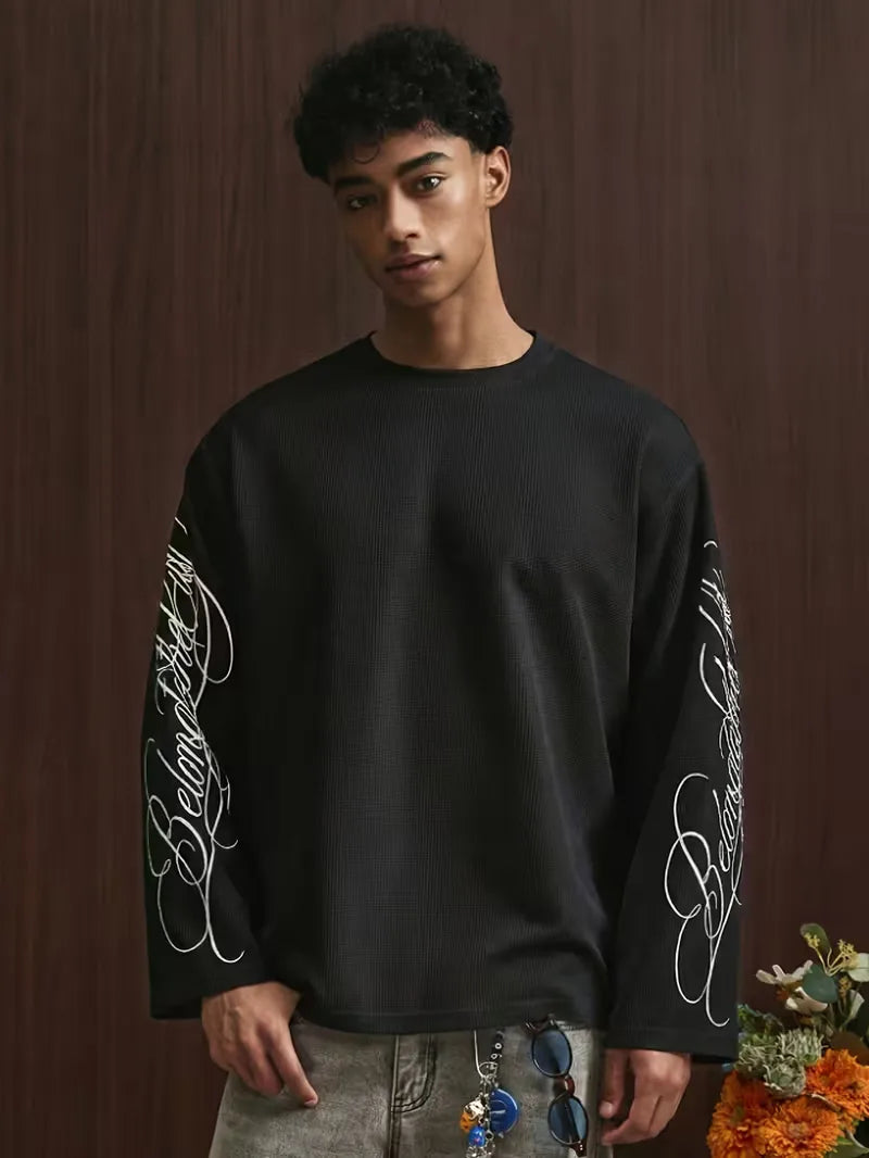 Oversize-Langarmshirt mit geschwungenem Alphabet-Schriftzug an den Ärmeln