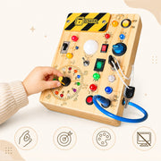 Busy Board aus Holz mit Lichtern, Schaltern und Knöpfen