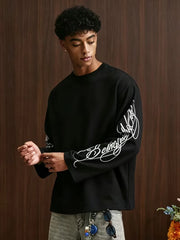 Oversize-Langarmshirt mit geschwungenem Alphabet-Schriftzug an den Ärmeln