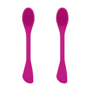 Zwei pinke doppelseitige Gesichtsmaske-Pinsel mit Silikonkopf und Spatelseite