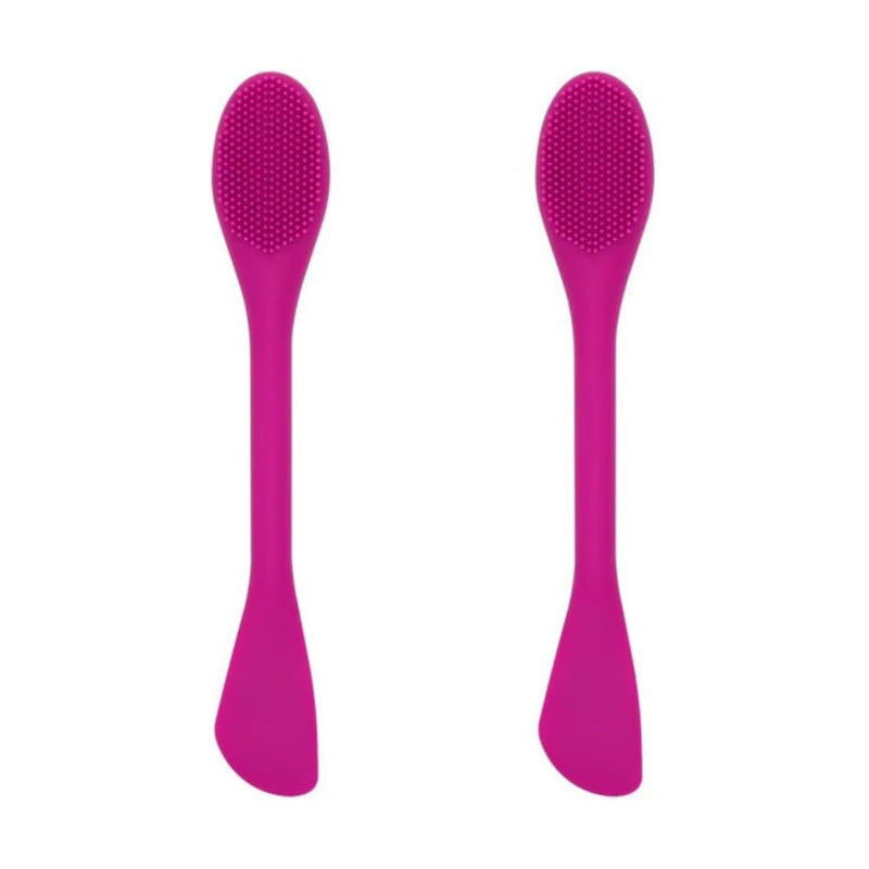 Zwei pinke doppelseitige Gesichtsmaske-Pinsel mit Silikonkopf und Spatelseite