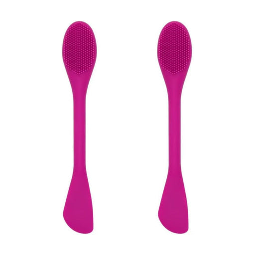 Zwei pinke doppelseitige Gesichtsmaske-Pinsel mit Silikonkopf und Spatelseite