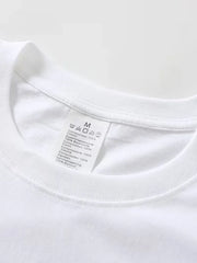 Langarmshirt mit Rundhalsausschnitt und kursiven schwarzen Schriftzügen