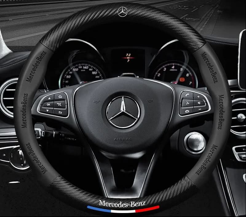 Lenkradbezug mit strukturierter Oberfläche, Mercedes-Benz Schriftzügen und farbigem Zierstreifen