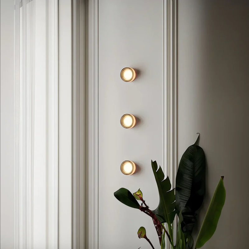 Runde dimmbare Wandleuchte mit konzentrischer Lichtscheibe