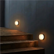 Runde dimmbare Wandleuchte mit konzentrischer Lichtscheibe