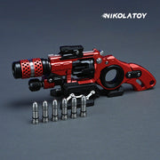 Rot-schwarzes Fidget-Spielzeug im Revolver-Design mit Drehzylinder und silberfarbenen Details