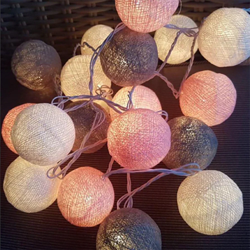 LED-Lichterkette mit gewebten Baumwollkugeln