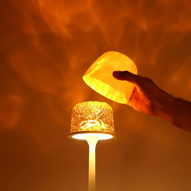 Kabellose beige Tischlampe mit warmem Aurora-Lichteffekt und rundem Standfuß