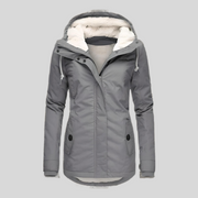 Lange Damen-Winterjacke mit Kapuze und Teddyfutter
