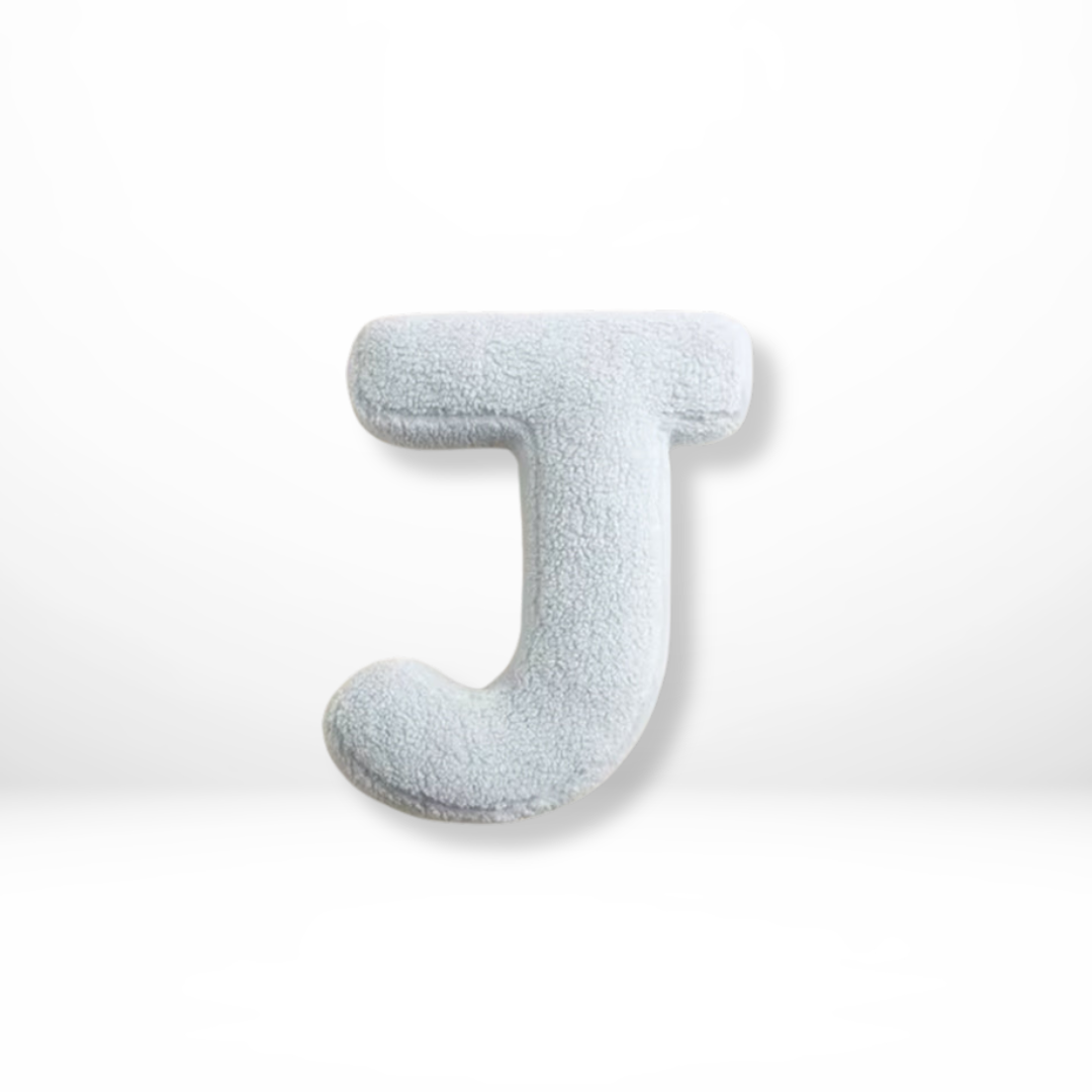 Weiches Buchstaben-Kissen aus Plüsch