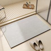 Saugfähige Badematte mit rutschhemmender Unterseite im Badezimmer
