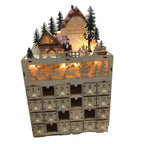Adventskalender aus Holz mit beleuchtetem Weihnachtsdorf