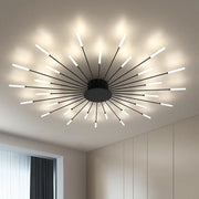 Moderne LED-Deckenleuchte mit radial angeordneten Lichtarmen im Strahlen-Design