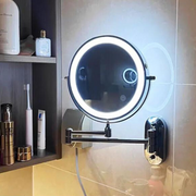 Schwarzer runder LED-Wandspiegel mit Schwenkarm und beleuchtetem Ring