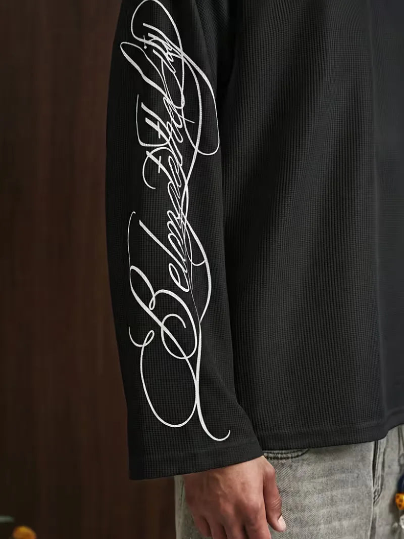 Oversize-Langarmshirt mit geschwungenem Alphabet-Schriftzug an den Ärmeln