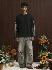 Oversize-Langarmshirt mit geschwungenem Alphabet-Schriftzug an den Ärmeln
