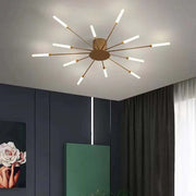 Moderne LED-Deckenleuchte mit radial angeordneten Lichtarmen im Strahlen-Design
