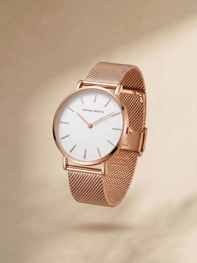 Analoge Armbanduhr mit rundem Zifferblatt und Metallgeflechtarmband