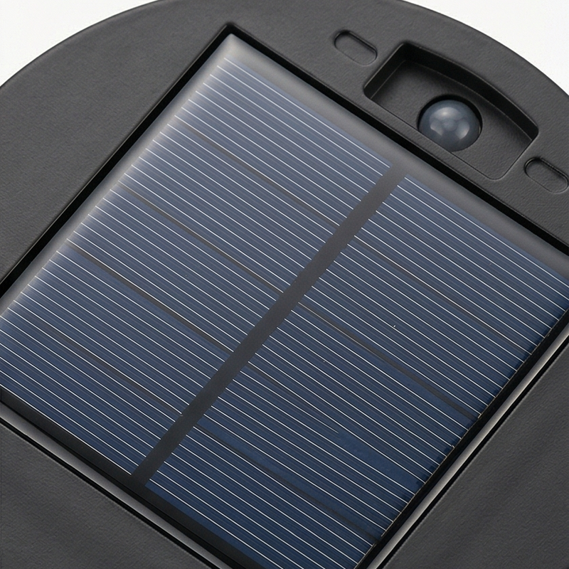Schwarze Solarleuchte mit Mandala-Muster und dekorativer Lichtprojektion