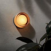 Runde dimmbare Wandleuchte mit konzentrischer Lichtscheibe