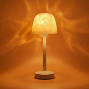 Kabellose beige Tischlampe mit warmem Aurora-Lichteffekt und rundem Standfuß
