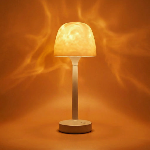 Kabellose beige Tischlampe mit warmem Aurora-Lichteffekt und rundem Standfuß