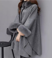 Eleganter Damen-Cape-Mantel mit Kunstfellbesatz