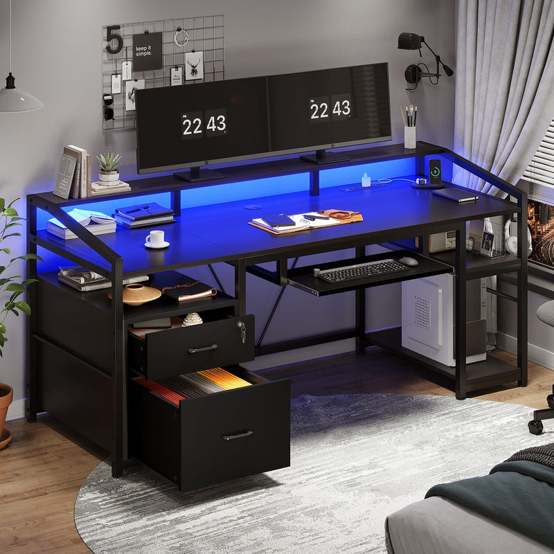 Schwarzer Gaming-Schreibtisch mit LED-Beleuchtung, Schubladen, Ablagen und Tastaturablage