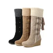 Gefütterte Damen-Keilstiefel mit Kunstfellbesatz