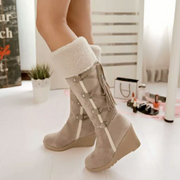Gefütterte Damen-Keilstiefel mit Kunstfellbesatz