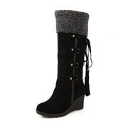 Gefütterte Damen-Keilstiefel mit Kunstfellbesatz
